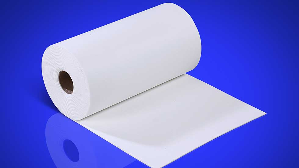 A roll of AES – Low Bio-Persistence Wool-based papers pictured on a blue background.